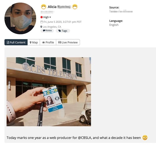 A screenshot of a social media post with an image of a person's work badge.
