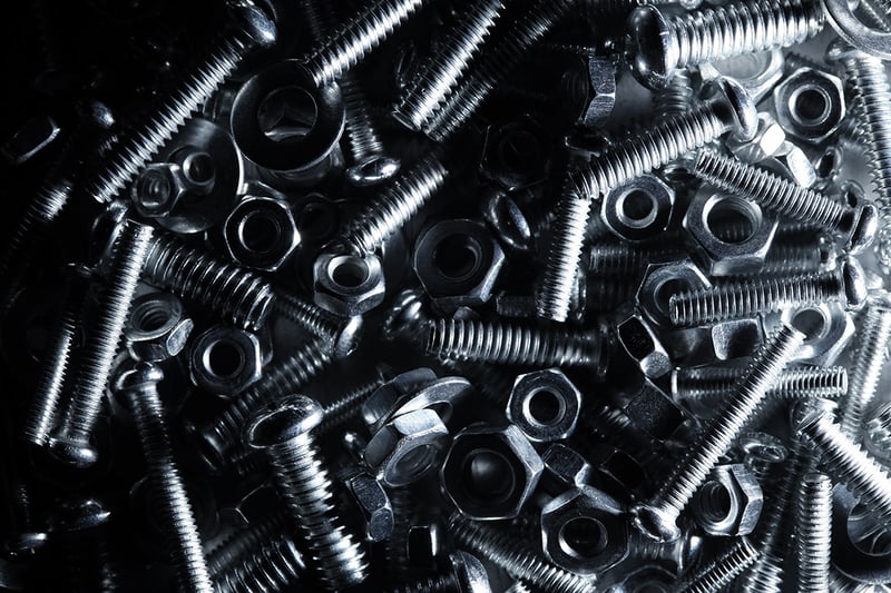 A closeup of a pile of nuts and bolts