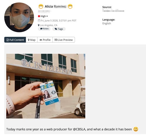 A screenshot of a social media post with an image of a work badge