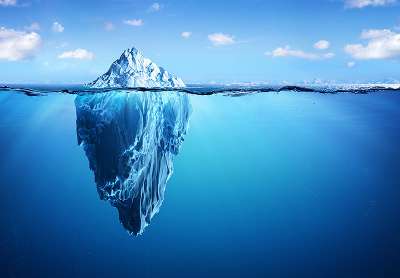 An iceberg floating in deep water