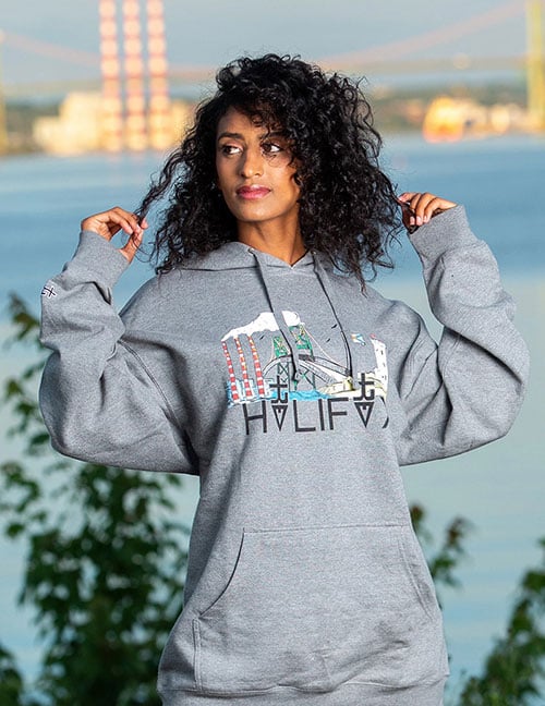 A woman modelling Trev Clothing hoodie